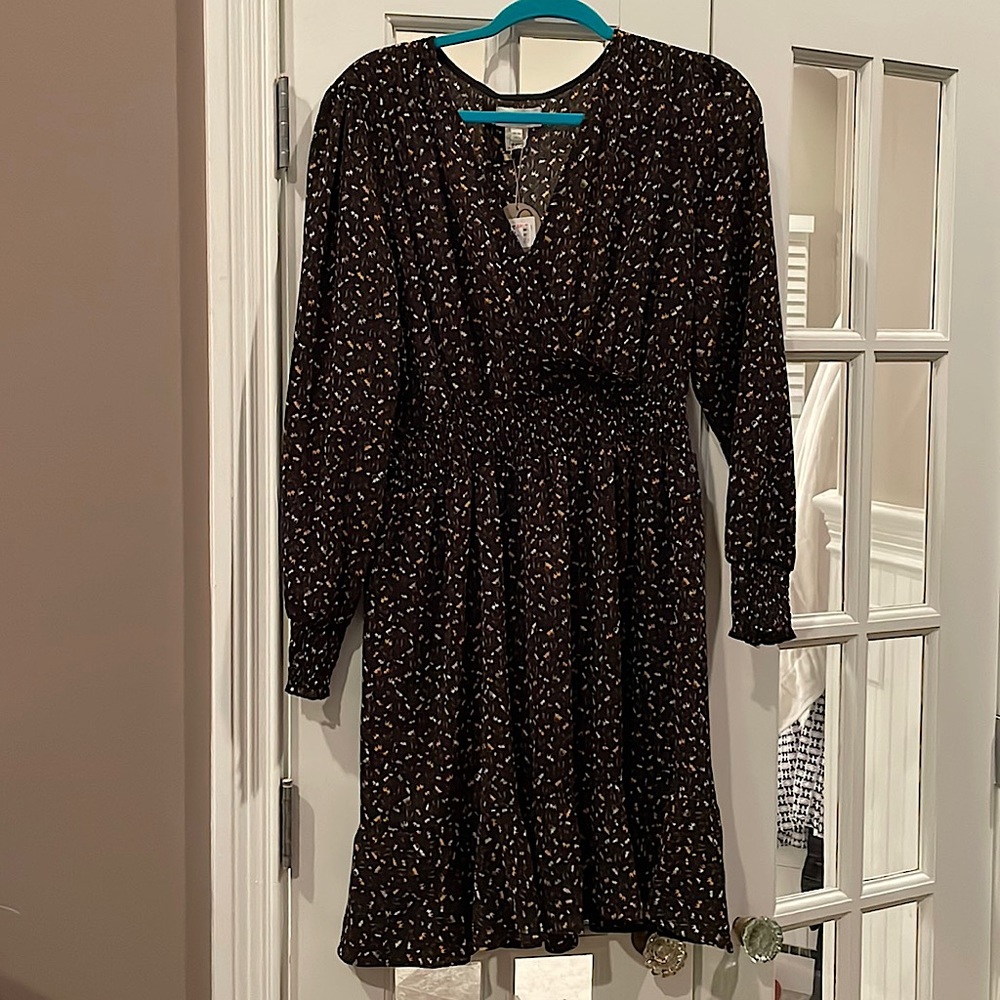 Black dress with small pattern. Great movement